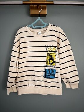 Striped Cream and Black Graphic Crewneck Sweater